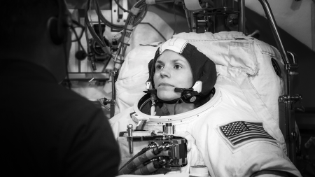 Zena Cardman getting suited in her astronaut gear.